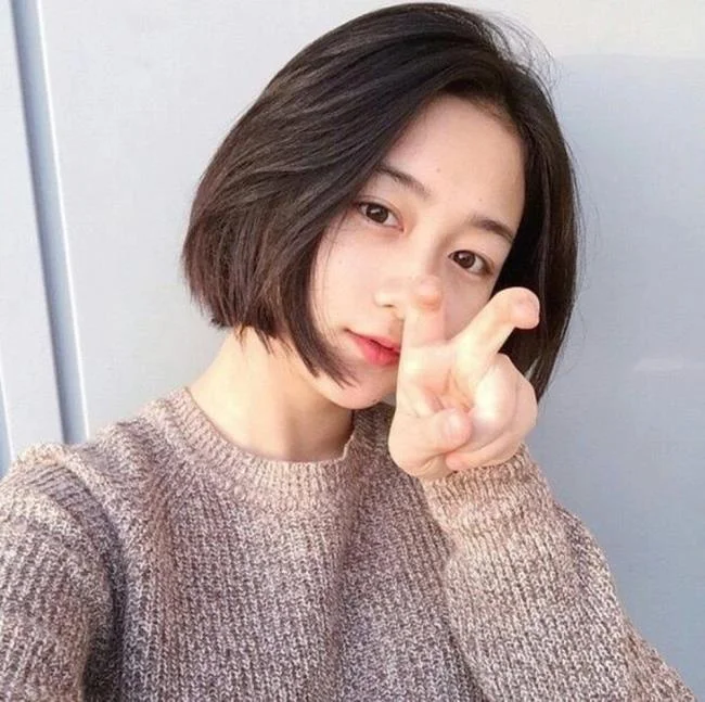Menggabungkan gaya rambut pendek yang paling indah hari ini