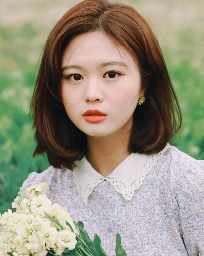 Menggabungkan gaya rambut pendek yang paling indah hari ini