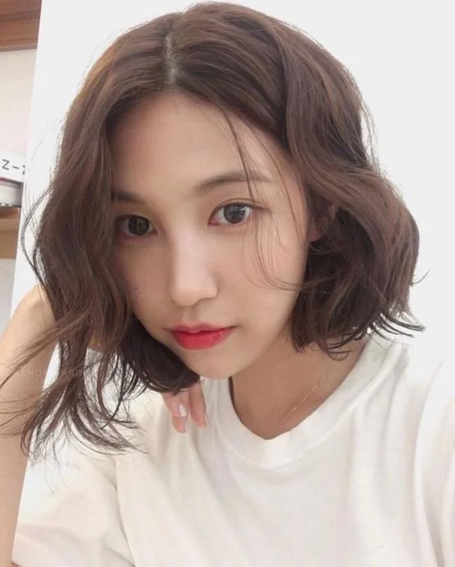 Menggabungkan gaya rambut pendek yang paling indah hari ini