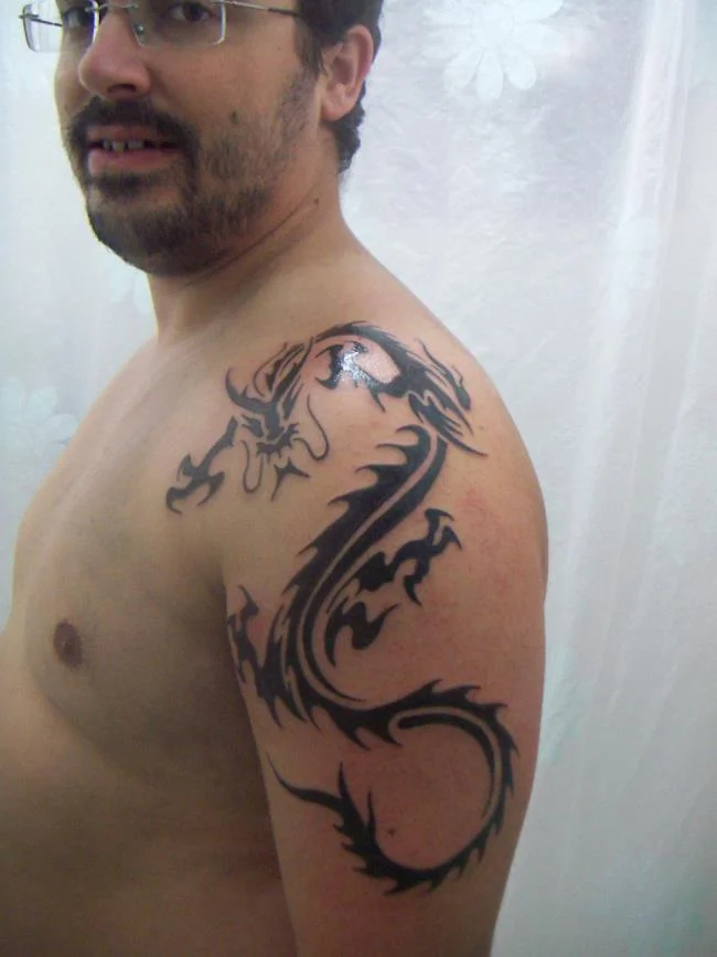 Koleksi 50 pola tato naga di lengan