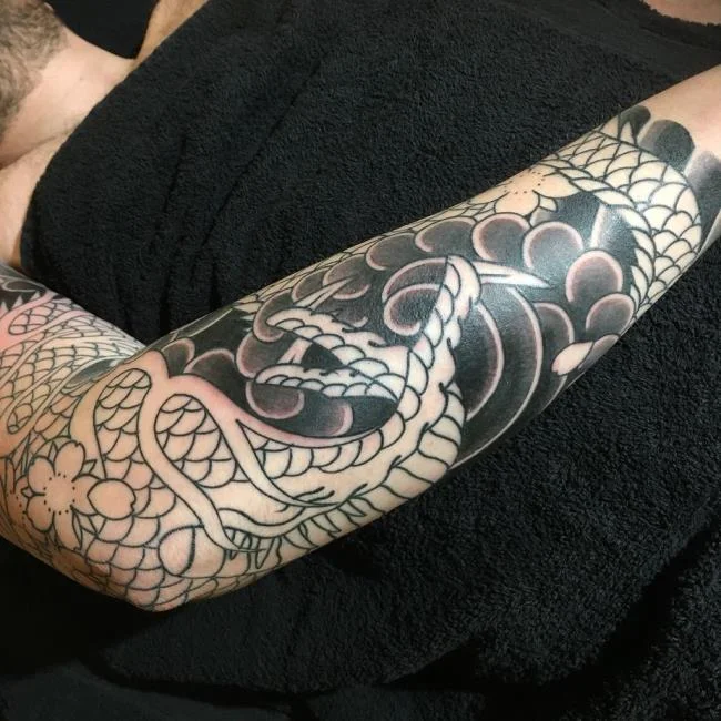 Koleksi 50 pola tato naga di lengan