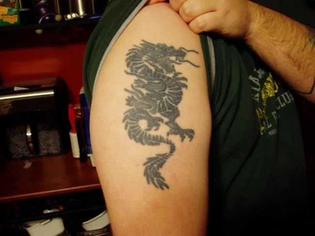 Koleksi 50 pola tato naga di lengan
