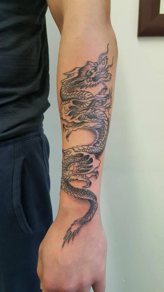 Koleksi 50 pola tato naga di lengan