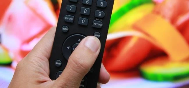 Press the SOURCE button on the remote