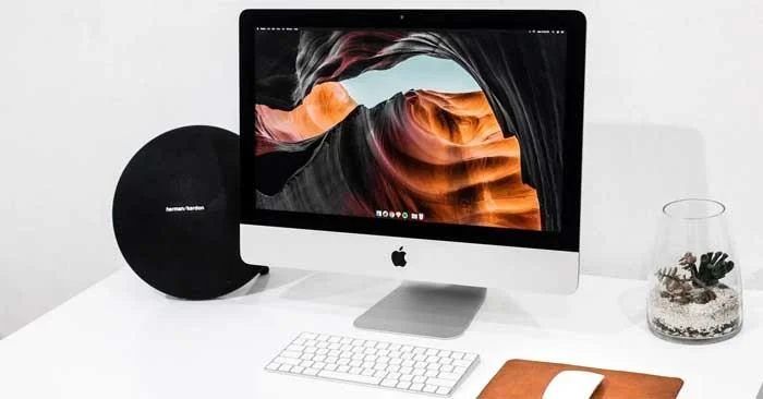 Como reproduzir áudio através de vários alto-falantes e fones de ouvido no Mac