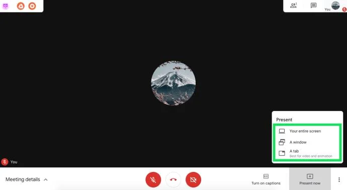 Jak udostępnić ekran w Google Meet