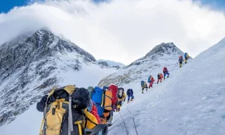 Why does climbing Mount Everest have to start at midnight?