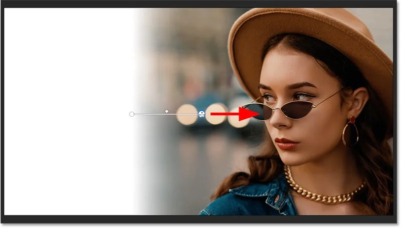 Hoe je snel een afbeelding in Photoshop kunt vervagen naar een achtergrondkleur met Live Gradients