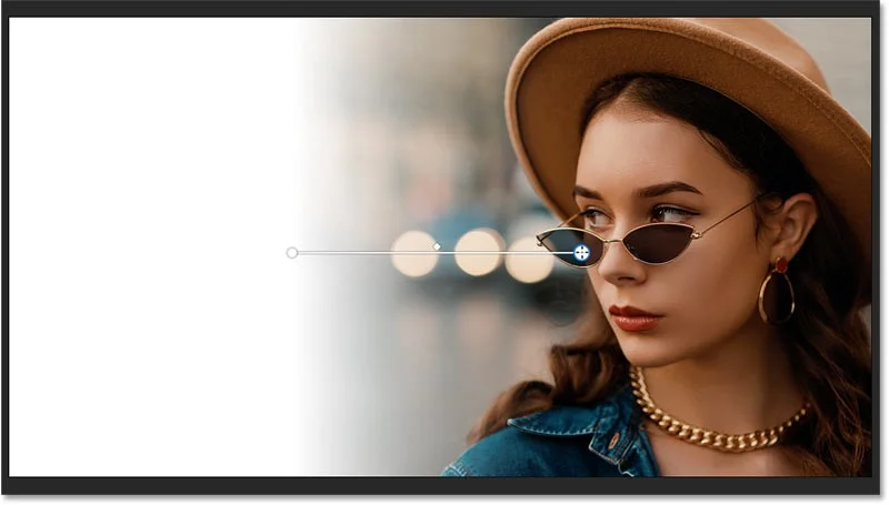 Hoe je snel een afbeelding in Photoshop kunt vervagen naar een achtergrondkleur met Live Gradients