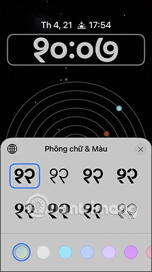 Come cambiare il colore dell'arcobaleno per l'orologio della schermata di blocco dell'iPhone