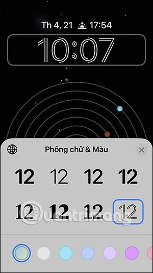 Come cambiare il colore dell'arcobaleno per l'orologio della schermata di blocco dell'iPhone